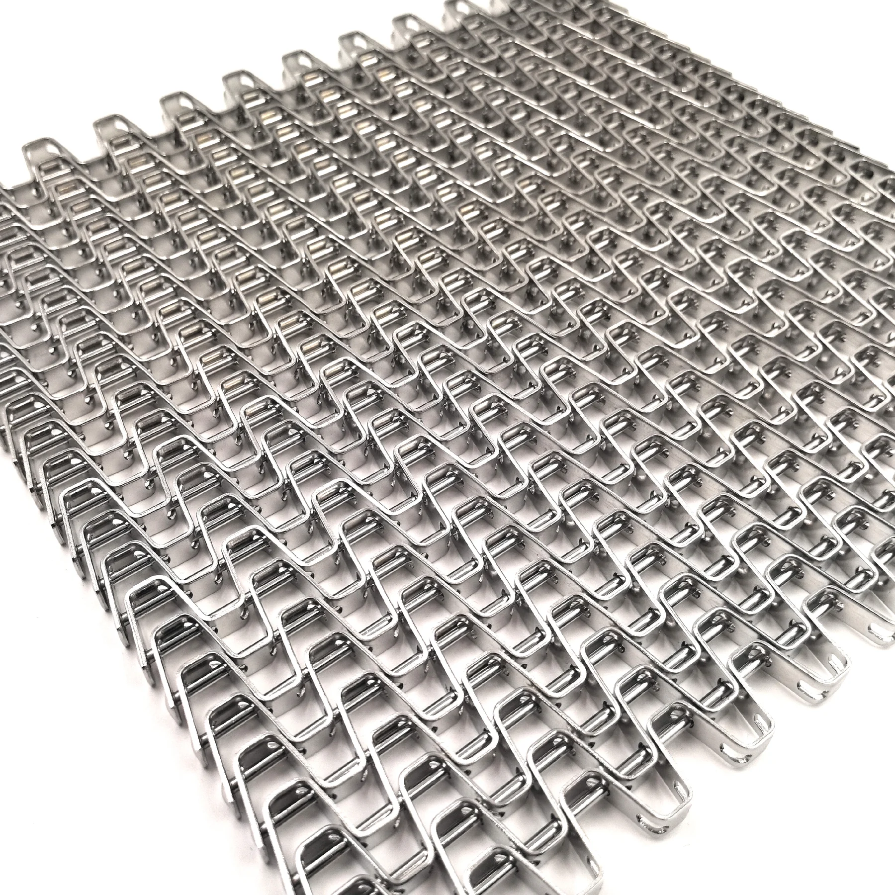 Close-up of an open-grid Flat Wire or Honeycomb Belt structure for equipment review.