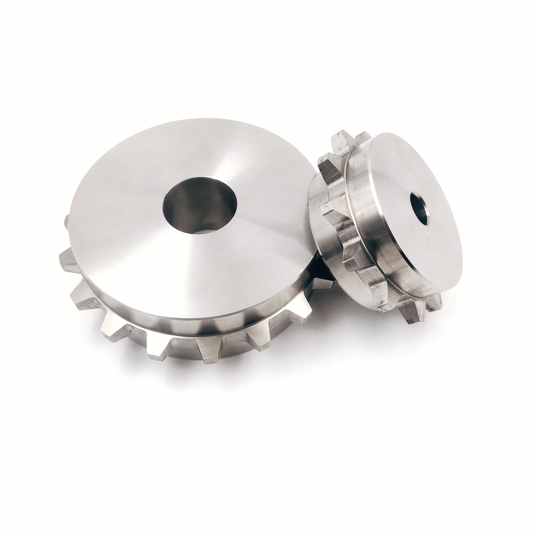 Metal sprockets shown as drive-component references for a belt project review.