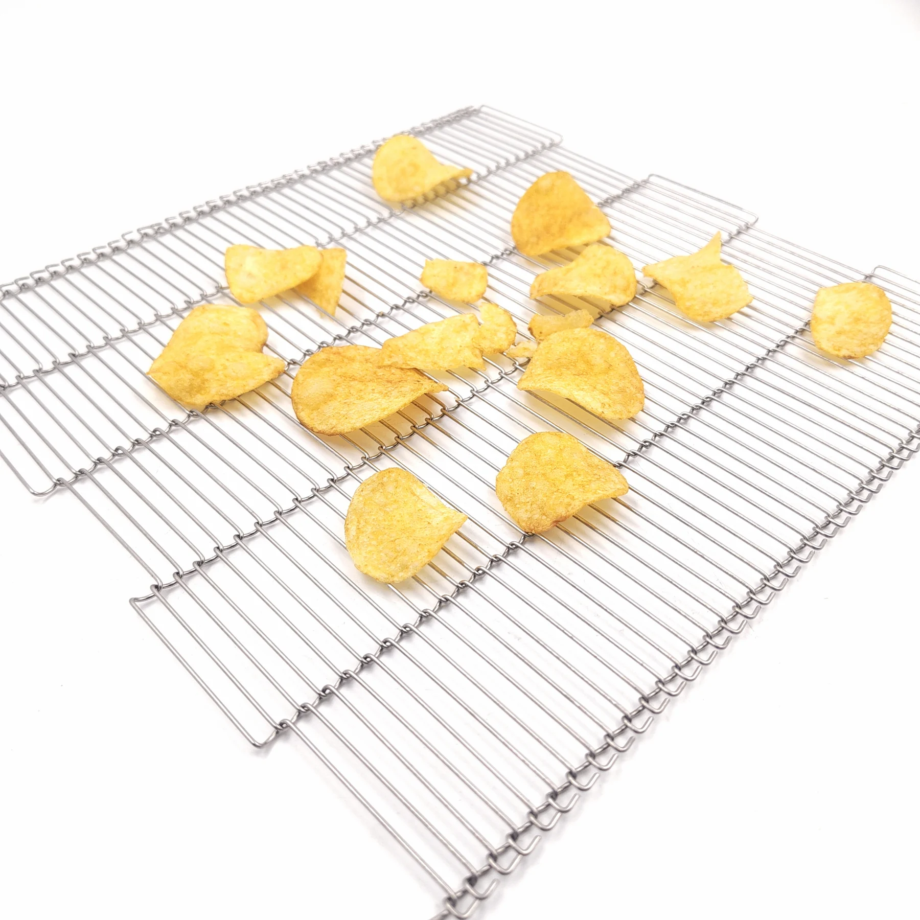 Z-Type Ladder Belt, also searched as Trapezoidal Mesh Belt, shown with visible snack pieces for product-support context.