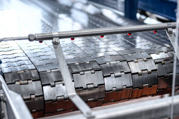 industrial metal conveyor belt. the tape consists of metal plates.