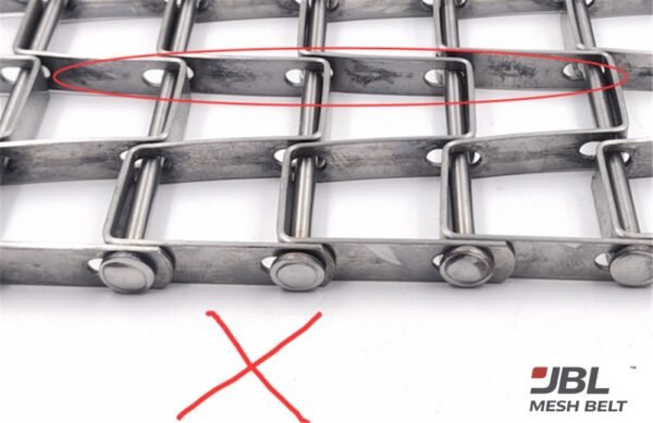 JBL Mesh Belt flat wire belt inspection: scratched strip inner face, rejected