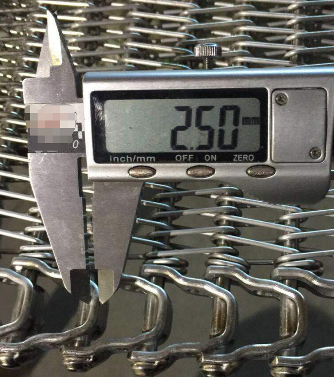 JBL Mesh Belt caliper measurement at a spiral belt edge link, showing a sample reading of 2.50 mm