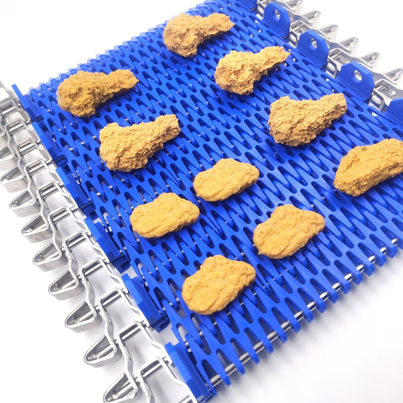 JBL Mesh Belt - Food on a blue conveyor surface